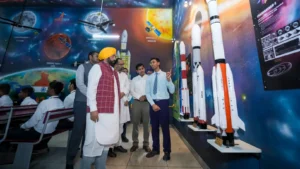 Punjab Chief Minister Bhagwant Mann interacting with students during a science and education exhibition in a school